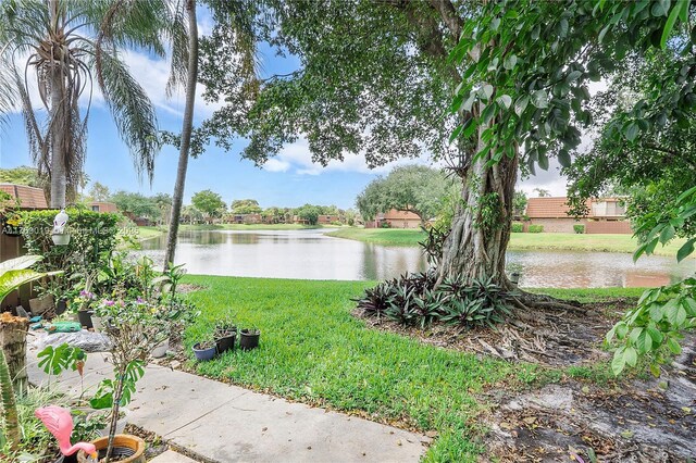 11861 SW 13th Ct, Davie, FL 33325 - view of green lawn with a water view