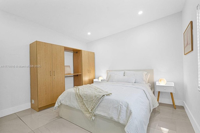bedroom with baseboards and recessed lighting