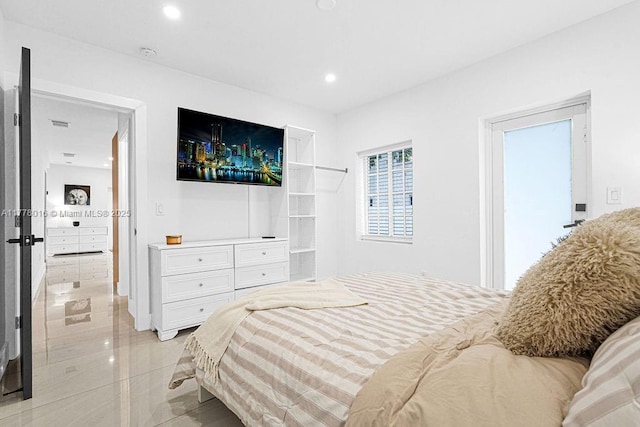 bedroom featuring recessed lighting and light tile patterned floors