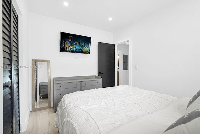 bedroom featuring recessed lighting and electric panel