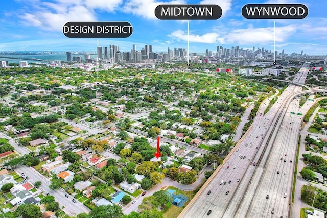 birds eye view of property with a city view
