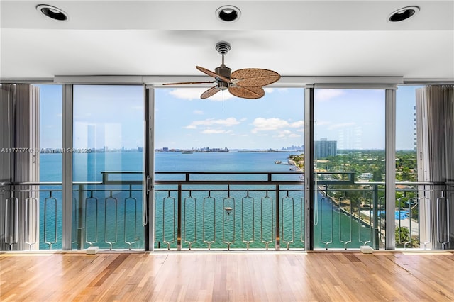 11111 Biscayne Blvd Unit 16G, Miami, FL 33181 - unfurnished sunroom with a water view