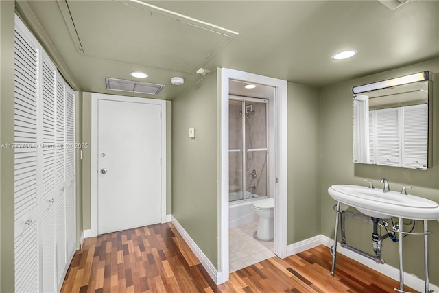 11111 Biscayne Blvd Unit 16G, Miami, FL 33181 - full bathroom featuring toilet, baseboards, wood finished floors, visible vents, and a closet
