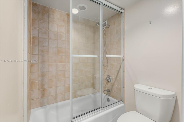 11111 Biscayne Blvd Unit 16G, Miami, FL 33181 - full bathroom featuring shower / bath combination with glass door and toilet