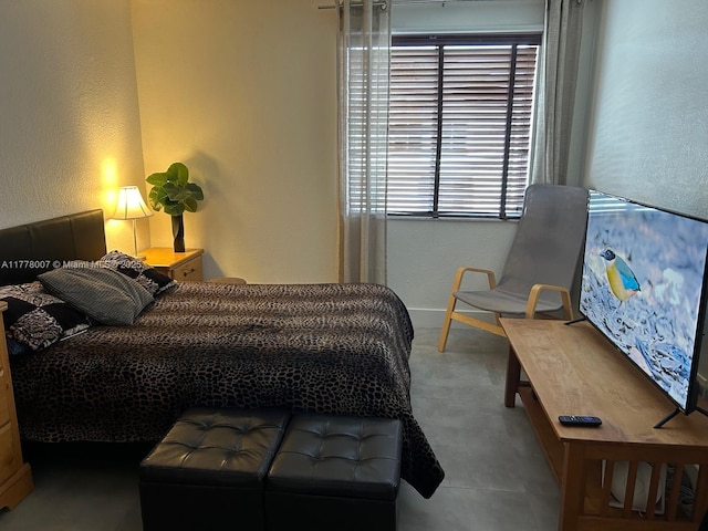 1138 NW 124th Ave Unit 2301, Miami, FL 33182 - bedroom featuring baseboards and a textured wall