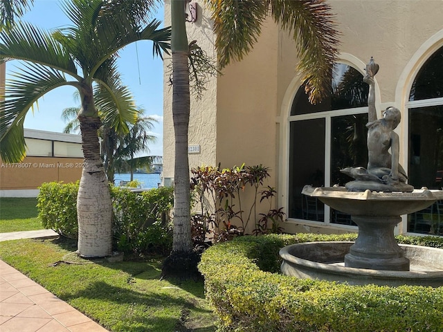 1138 NW 124th Ave Unit 2301, Miami, FL 33182 - view of property exterior with stucco siding