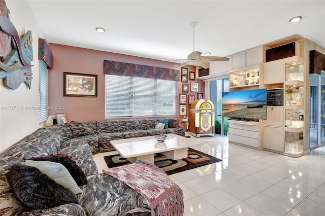 living room featuring recessed lighting, ceiling fan, and light tile patterned flooring