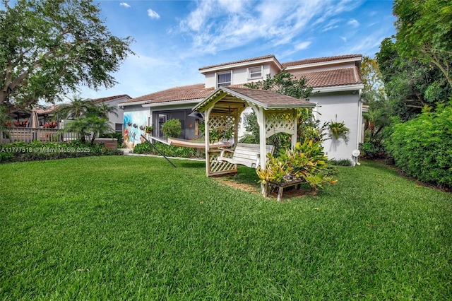 view of yard with a sunroom