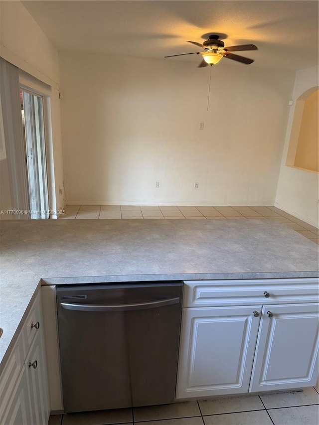 5031 SW 135th Ave Unit 5031, Miramar, FL 33027 - kitchen featuring stainless steel dishwasher, white cabinetry, a ceiling fan, and light tile patterned flooring