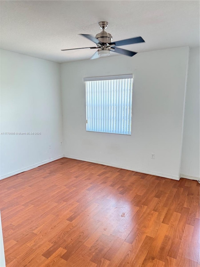 5031 SW 135th Ave Unit 5031, Miramar, FL 33027 - empty room featuring ceiling fan, light wood-type flooring, and baseboards