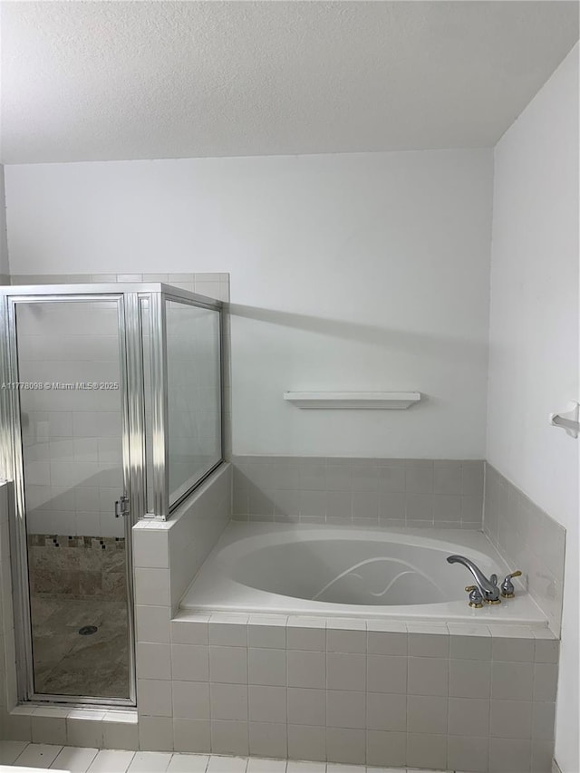 5031 SW 135th Ave Unit 5031, Miramar, FL 33027 - full bathroom featuring a bath and a shower stall