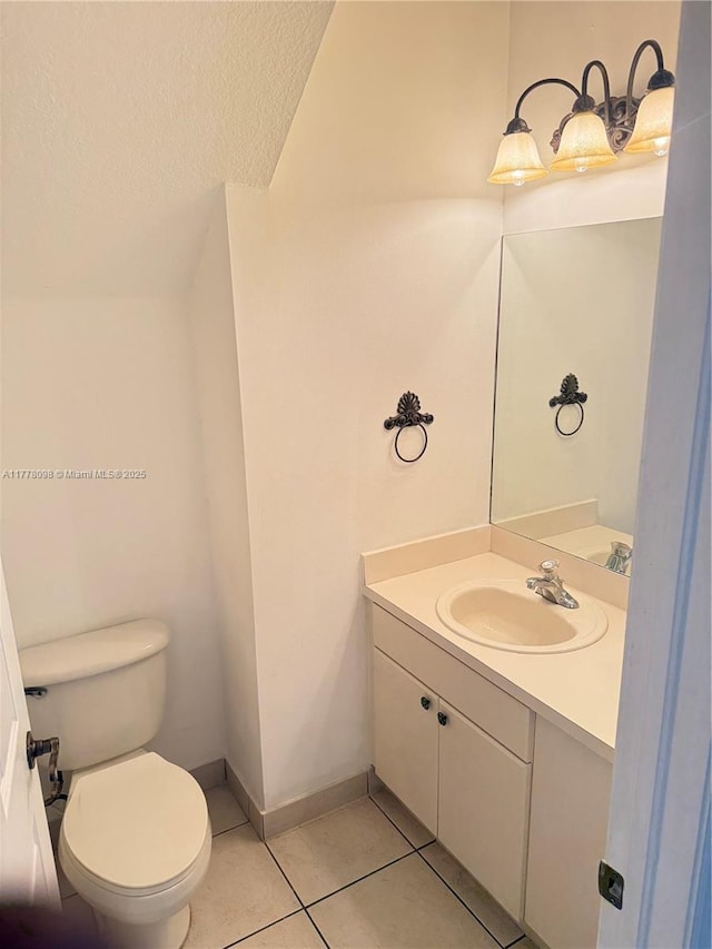 5031 SW 135th Ave Unit 5031, Miramar, FL 33027 - bathroom with toilet, tile patterned floors, vanity, and a textured ceiling