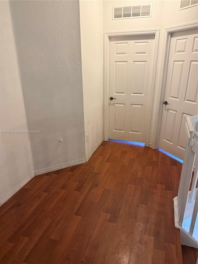 5031 SW 135th Ave Unit 5031, Miramar, FL 33027 - hall featuring dark wood finished floors and baseboards