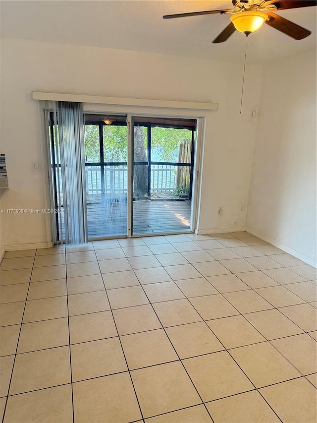 5031 SW 135th Ave Unit 5031, Miramar, FL 33027 - unfurnished room featuring a ceiling fan, light tile patterned floors, and baseboards