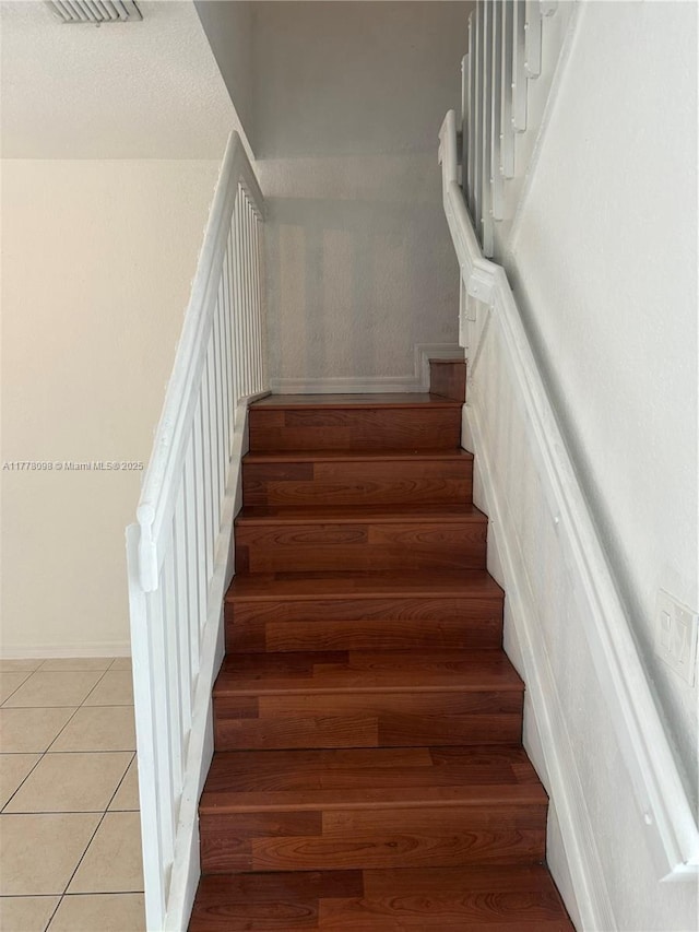 5031 SW 135th Ave Unit 5031, Miramar, FL 33027 - stairway with baseboards and wood finished floors