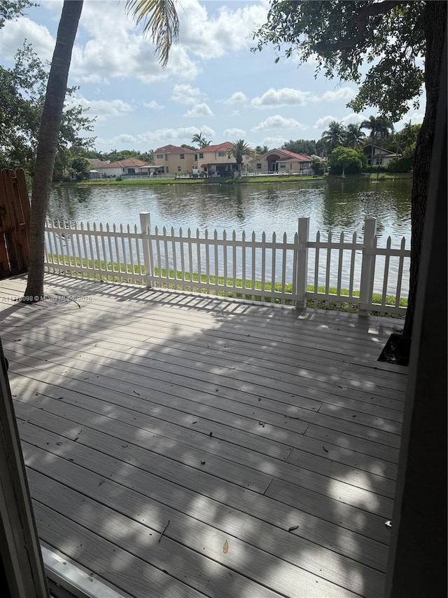 5031 SW 135th Ave Unit 5031, Miramar, FL 33027 - wooden deck featuring a water view and a residential view
