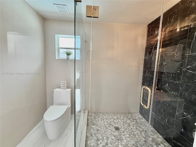 full bathroom with a marble finish shower, visible vents, and toilet