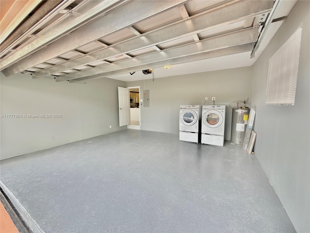 garage with water heater, separate washer and dryer, and electric panel