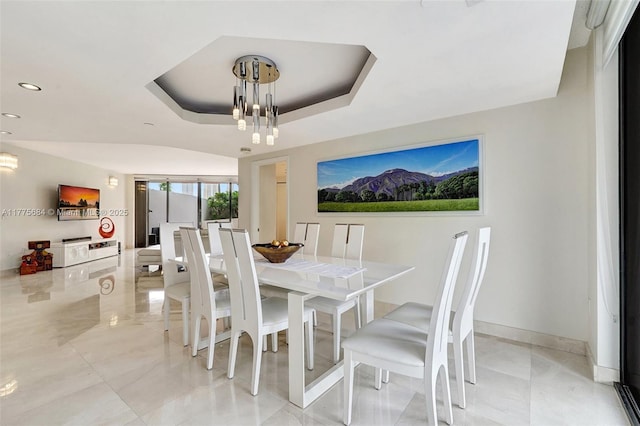 4000 Island Blvd Unit 402, Aventura, FL 33160 - dining area with a chandelier, recessed lighting, a tray ceiling, and baseboards