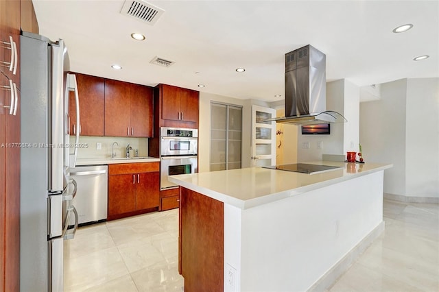 4000 Island Blvd Unit 402, Aventura, FL 33160 - kitchen featuring visible vents, light countertops, a peninsula, stainless steel appliances, and island range hood