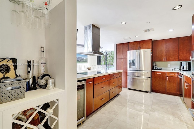4000 Island Blvd Unit 402, Aventura, FL 33160 - kitchen with visible vents, stainless steel fridge, black electric cooktop, light countertops, and island exhaust hood