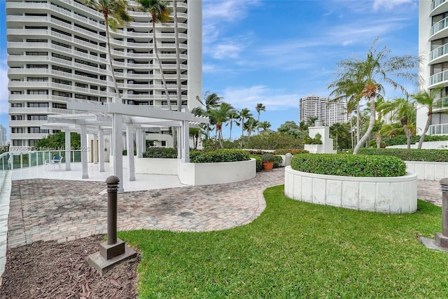 4000 Island Blvd Unit 402, Aventura, FL 33160 - view of yard featuring a patio and a pergola
