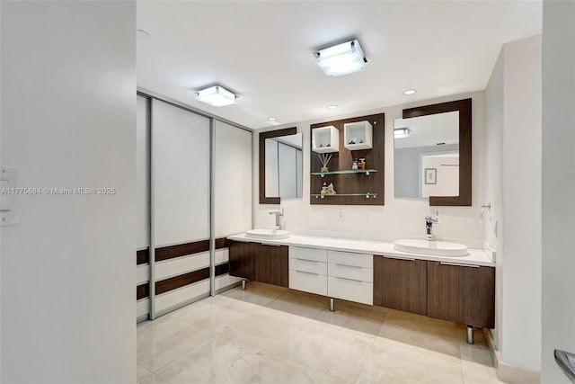 4000 Island Blvd Unit 402, Aventura, FL 33160 - full bathroom with tile patterned flooring, double vanity, and a sink