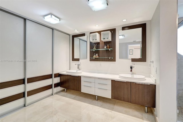 4000 Island Blvd Unit 402, Aventura, FL 33160 - bathroom featuring double vanity, a sink, and recessed lighting