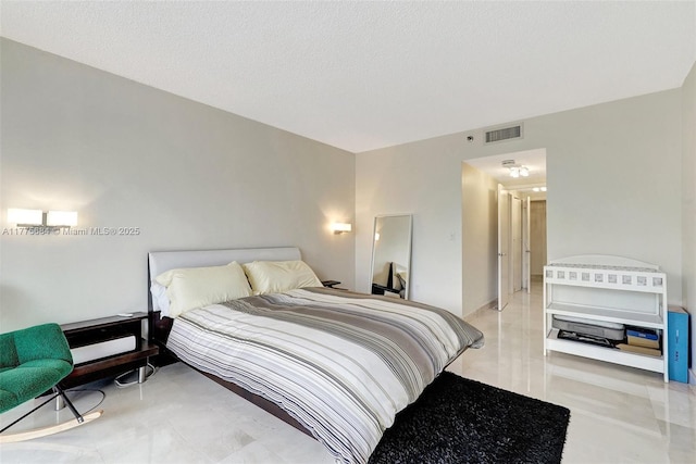 4000 Island Blvd Unit 402, Aventura, FL 33160 - bedroom featuring visible vents and a textured ceiling