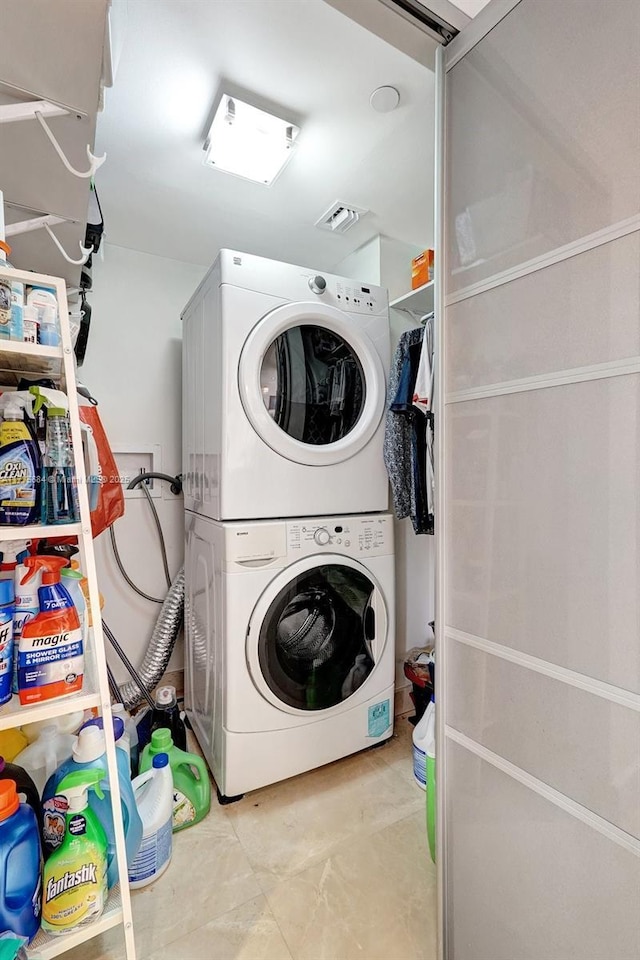 4000 Island Blvd Unit 402, Aventura, FL 33160 - laundry area with laundry area and stacked washer / drying machine