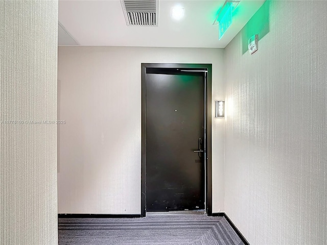 doorway to property featuring visible vents