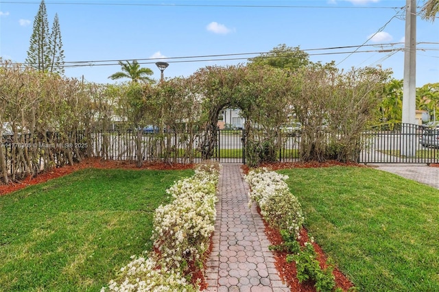 view of yard featuring a gate and fence