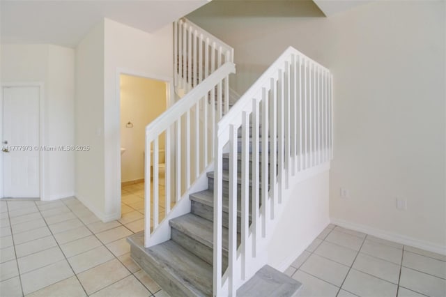12376 SW 126th Ave Unit 12376, Miami, FL 33186 - staircase featuring tile patterned floors and baseboards
