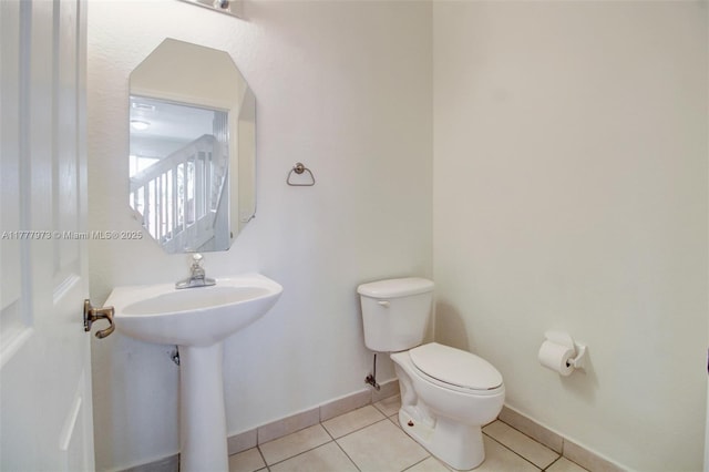 12376 SW 126th Ave Unit 12376, Miami, FL 33186 - half bath with toilet, tile patterned floors, and baseboards