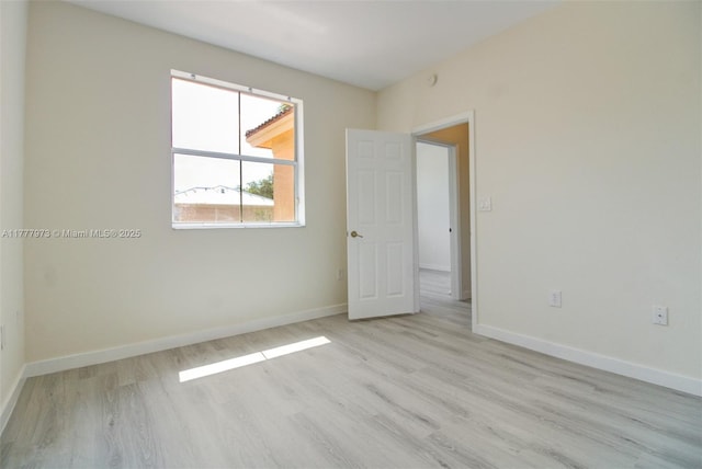 12376 SW 126th Ave Unit 12376, Miami, FL 33186 - unfurnished room with light wood-type flooring and baseboards