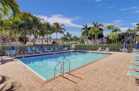 12376 SW 126th Ave Unit 12376, Miami, FL 33186 - community pool with a patio area