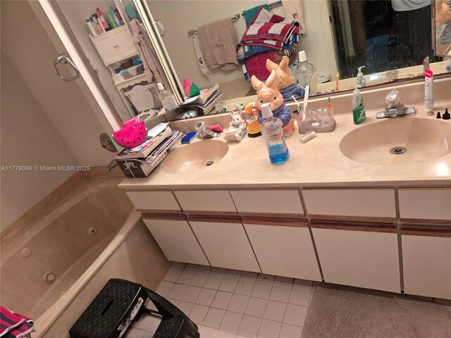 full bathroom with double vanity, a sink, tile patterned floors, and a combined bath / shower with jetted tub