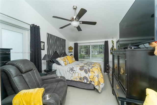 tiled bedroom with vaulted ceiling and ceiling fan