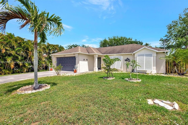 ranch-style house with a front yard, stucco siding, a garage, and concrete driveway