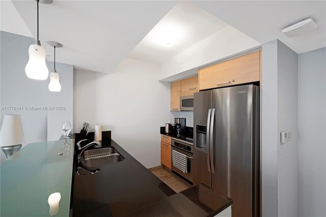 18683 Collins Ave Unit 2006, Sunny Isles Beach, FL 33160 - kitchen featuring baseboards, a sink, dark countertops, stainless steel dishwasher, and light tile patterned flooring
