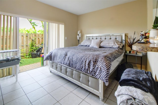 tiled bedroom with access to outside