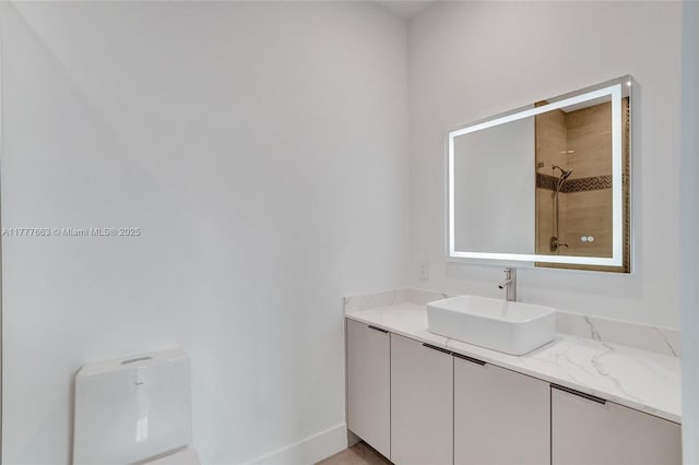 852 Heritage Dr, Weston, FL 33326 - full bathroom with vanity, tiled shower, and baseboards
