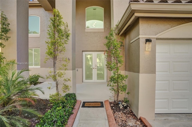 852 Heritage Dr, Weston, FL 33326 - view of exterior entry featuring french doors and stucco siding