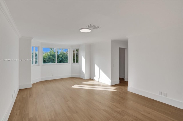 852 Heritage Dr, Weston, FL 33326 - unfurnished room with light wood-type flooring, baseboards, and ornamental molding