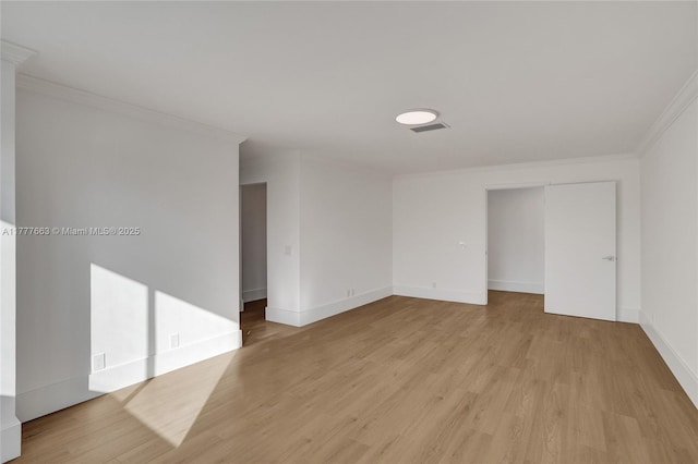 852 Heritage Dr, Weston, FL 33326 - empty room with ornamental molding, light wood-type flooring, and baseboards