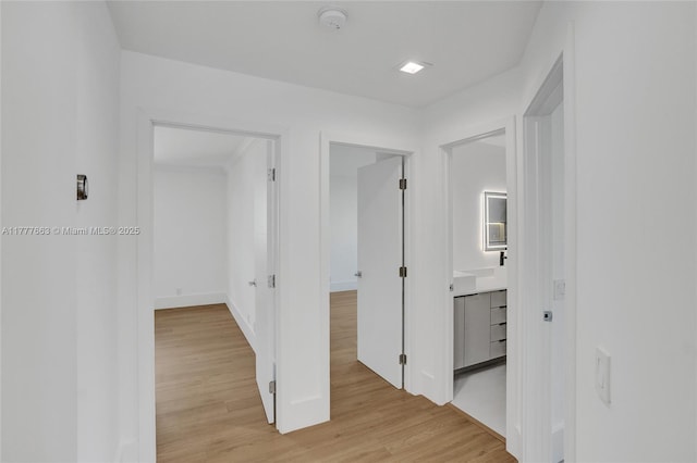 852 Heritage Dr, Weston, FL 33326 - corridor featuring light wood finished floors and baseboards