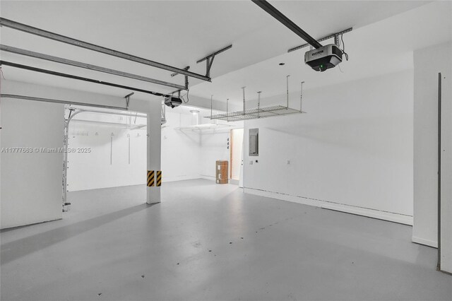 852 Heritage Dr, Weston, FL 33326 - garage with a garage door opener and electric panel
