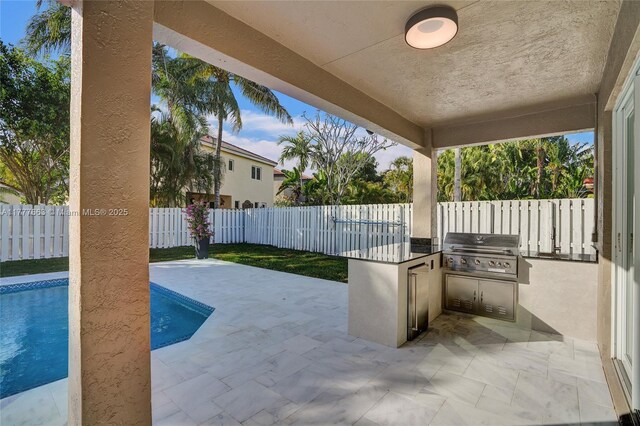 852 Heritage Dr, Weston, FL 33326 - fenced backyard with a patio area