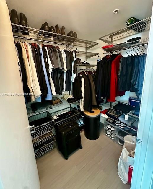 92 SW 3rd St Unit 4104, Miami, FL 33130 - walk in closet with wood finished floors
