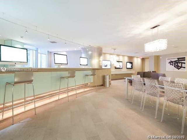 92 SW 3rd St Unit 4104, Miami, FL 33130 - dining space with wood finished floors and rail lighting
